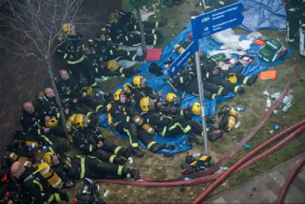 Heroes! Photo Of Firefighters Looking Very Tired After Putting Off The Grenfell Towers Fire
